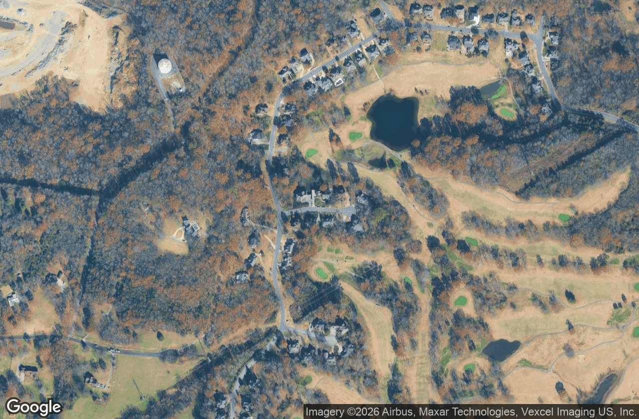Aerial view of Country Hills beside the golf course