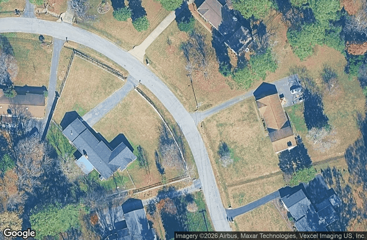 Wooded half-acre lots from above.